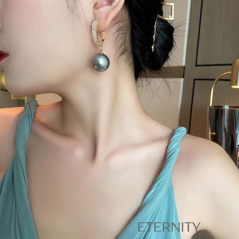 Zarcillos Nacre Sparkle con Perlas  Zarcillos Champagne Perla Unica Acero Inoxidable  ETERNITY