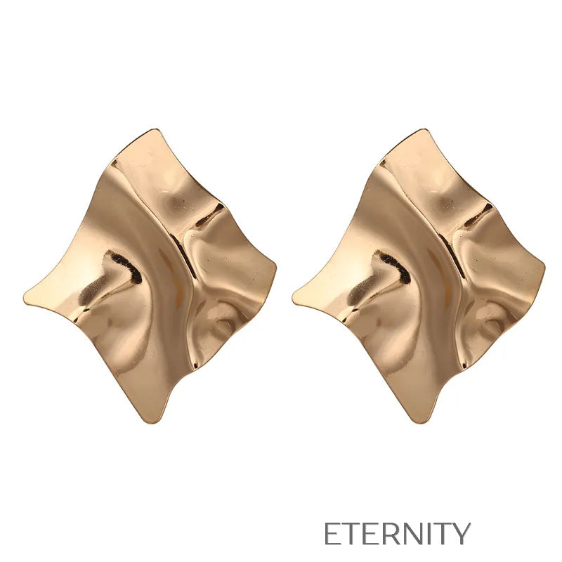 Zarcillos Sculptural Gold de Diseño Geométrico en Oro y Plata  Zarcillos Dorado Unica Acero Inoxidable  ETERNITY