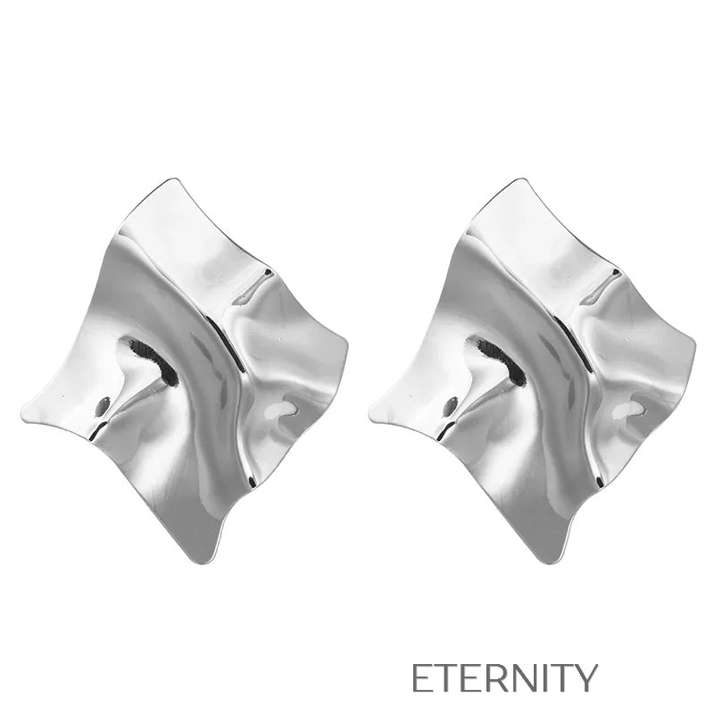 Zarcillos Sculptural Gold de Diseño Geométrico en Oro y Plata  Zarcillos Dorado Unica Acero Inoxidable  ETERNITY