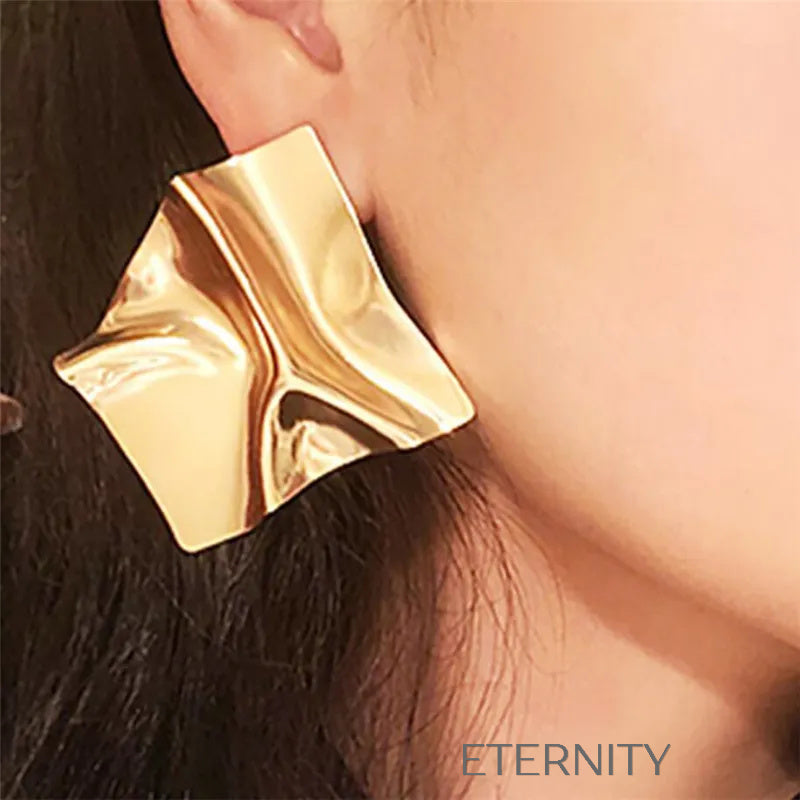 Zarcillos Sculptural Gold de Diseño Geométrico en Oro y Plata  Zarcillos Dorado Unica Acero Inoxidable  ETERNITY
