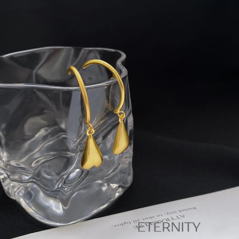 Zarcillos Liquid Heart en Gold y Silver  Zarcillos Dorado Unica Acero Inoxidable  ETERNITY