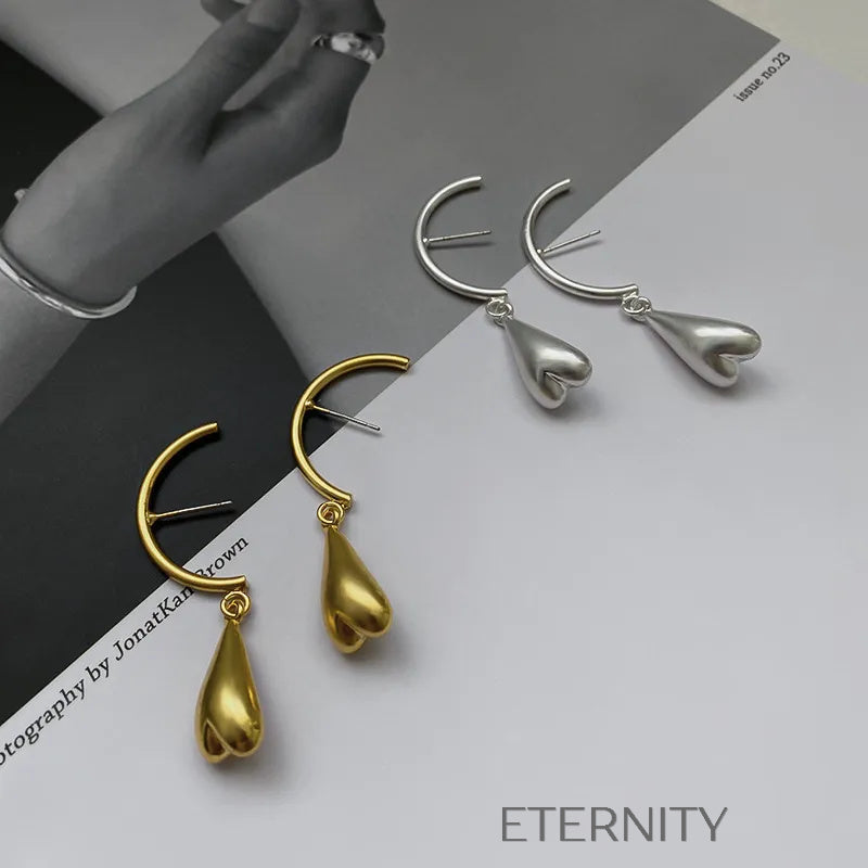 Zarcillos Liquid Heart en Gold y Silver  Zarcillos Dorado Unica Acero Inoxidable  ETERNITY