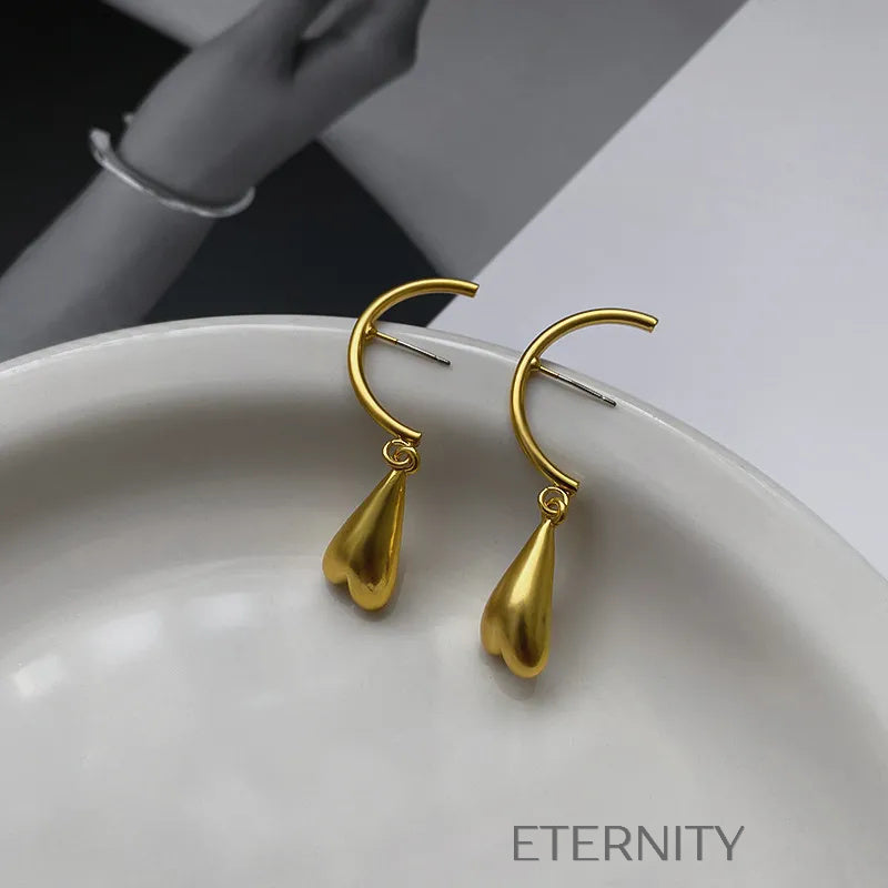 Zarcillos Liquid Heart en Gold y Silver  Zarcillos Dorado Unica Acero Inoxidable  ETERNITY