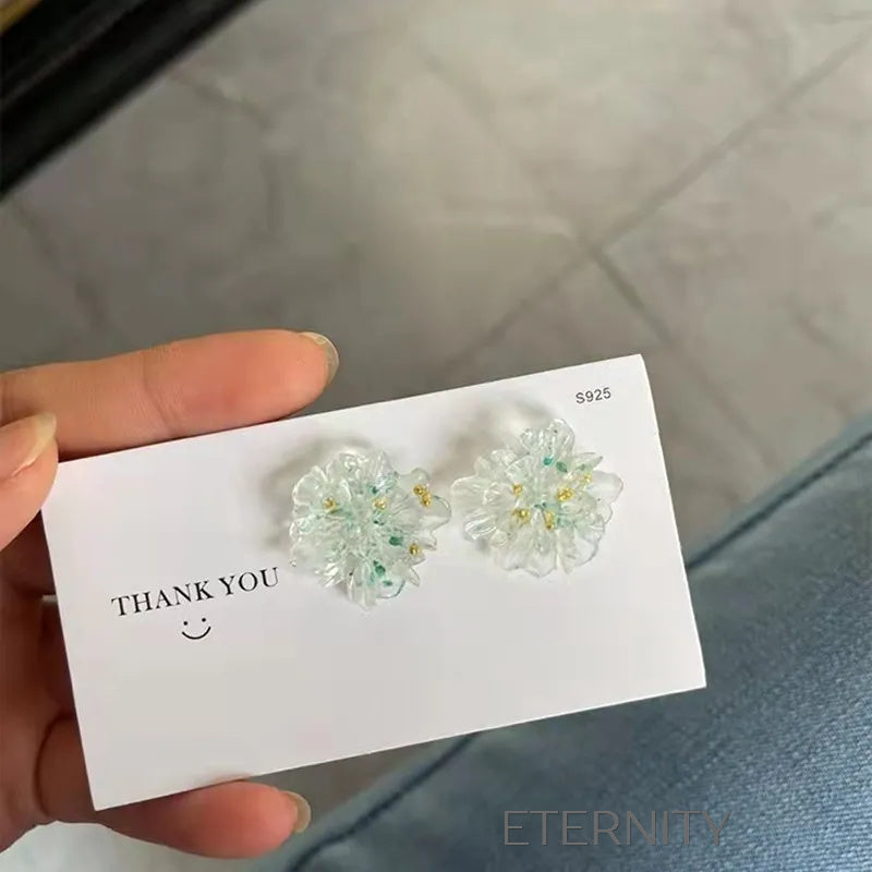 Zarcillos Bloom Petals Florales  Zarcillos Azul Unica Acero Inoxidable  ETERNITY