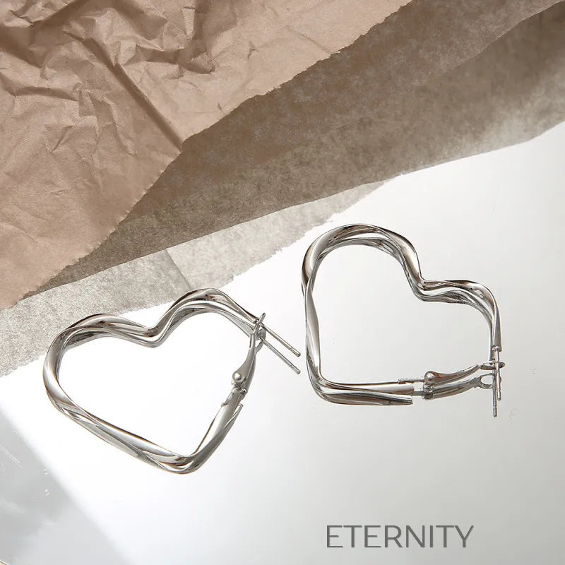 Zarcillos de Aro Ethereal Heart con Diseño Entrelazado y Acabado en Plata  Zarcillos Plateado Unica Acero Inoxidable  ETERNITY