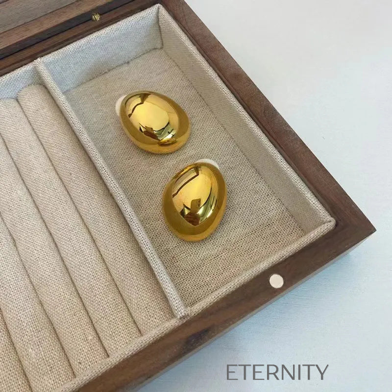 Zarcillos Moonlight Drop Ovalados  Zarcillos Dorado Unica Acero Inoxidable  ETERNITY