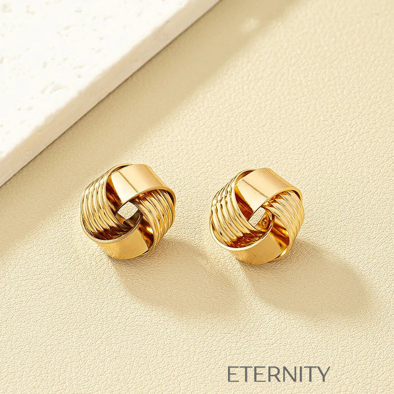 Zarcillos de Botón Ethereal Knot con Diseño de Nudo Entrelazado  Zarcillos Dorado Unica Acero Inoxidable  ETERNITY