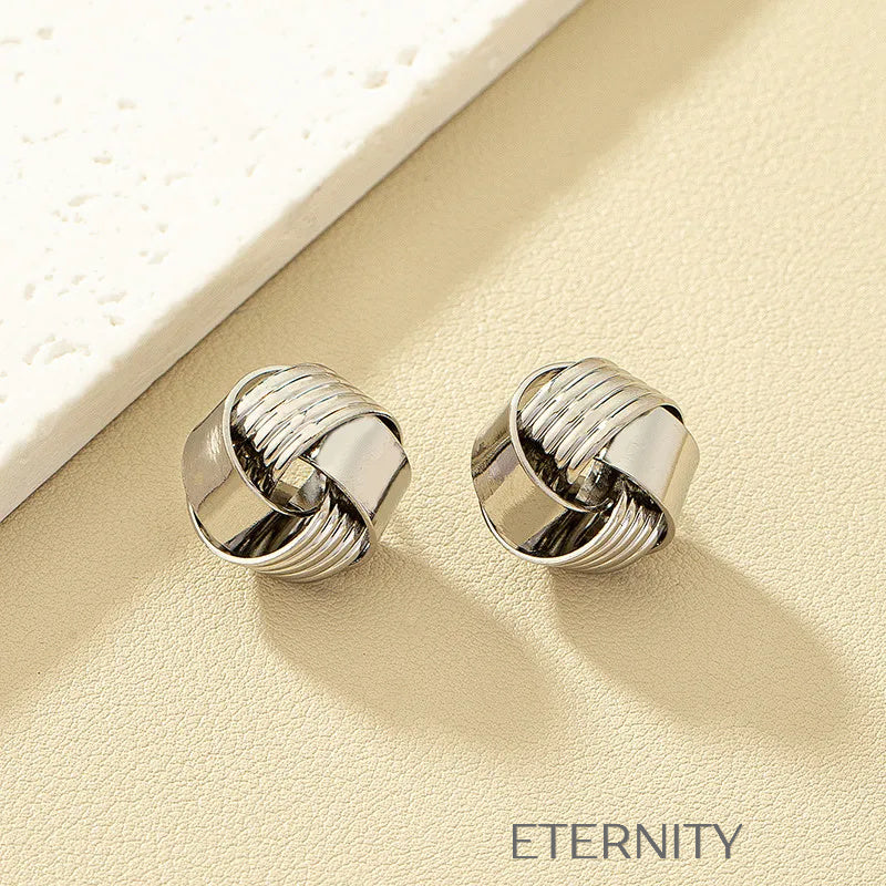 Zarcillos de Botón Ethereal Knot con Diseño de Nudo Entrelazado  Zarcillos Dorado Unica Acero Inoxidable  ETERNITY