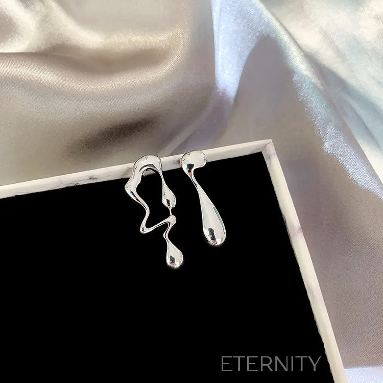 Zarcillos de Metal Líquido Orgánico en Oro y Plata  Zarcillos Dorado Unica Acero Inoxidable  ETERNITY