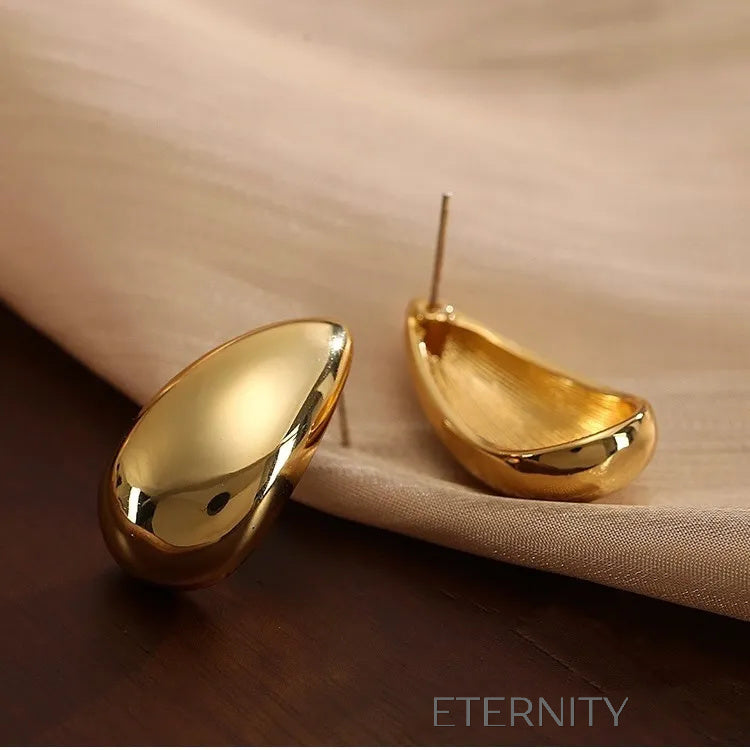 Zarcillos de Botón Luminous Teardrop con Diseño de Gota Escultural  Zarcillos Dorado Unica Acero Inoxidable  ETERNITY
