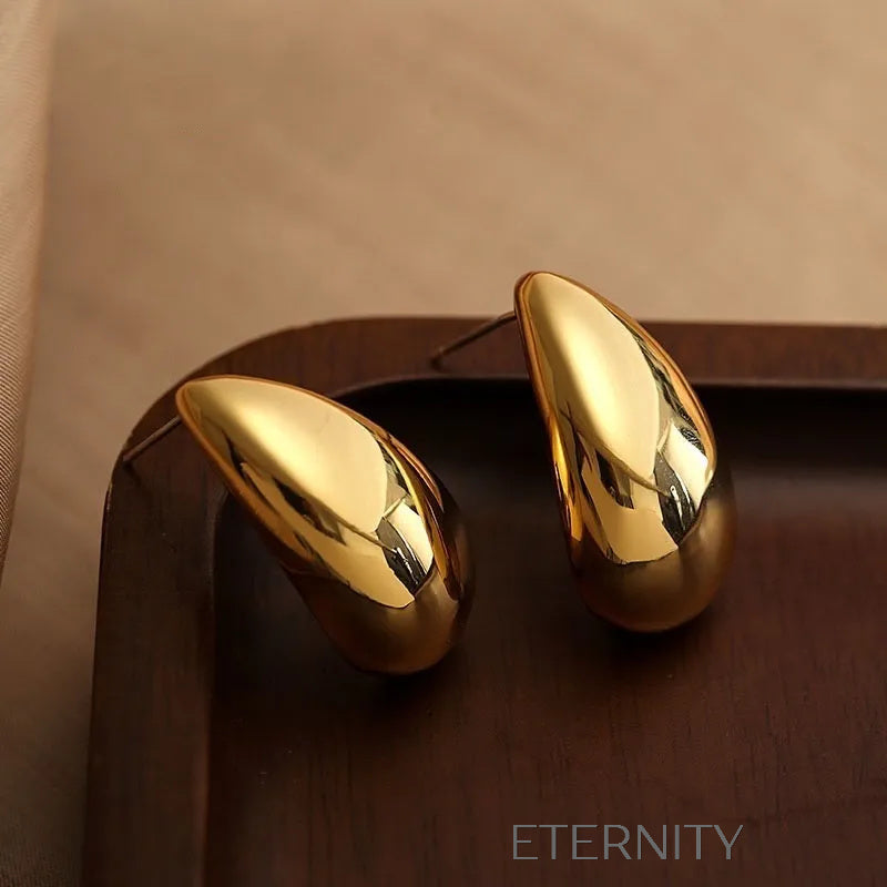 Zarcillos de Botón Luminous Teardrop con Diseño de Gota Escultural  Zarcillos Dorado Unica Acero Inoxidable  ETERNITY