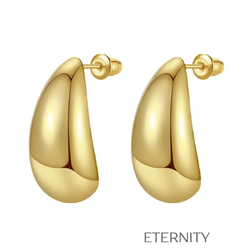 Zarcillos de Botón Luminous Teardrop con Diseño de Gota Escultural  Zarcillos Dorado Unica Acero Inoxidable  ETERNITY