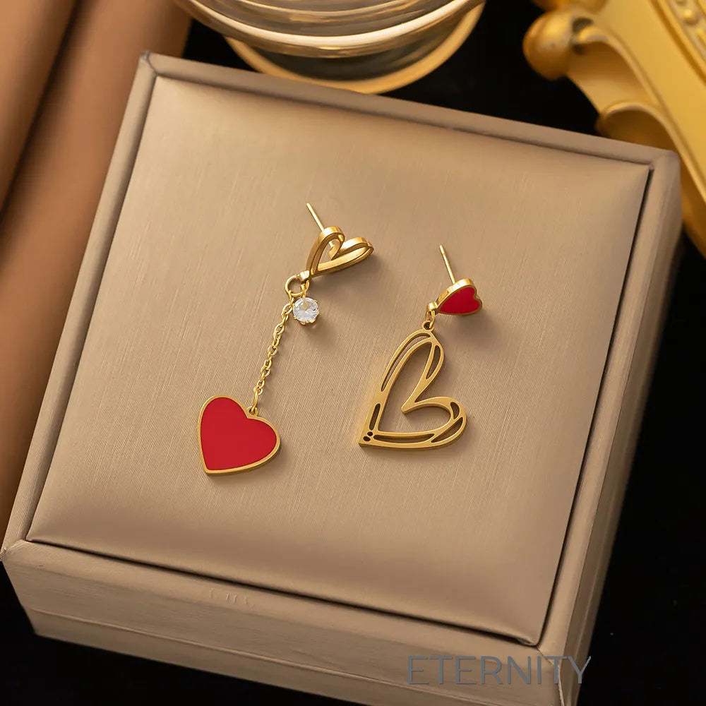 Zarcillos Asimétricos de Corazón en Oro y Esmalte Rojo  Zarcillos Dorado Unica Acero Inoxidable  ETERNITY