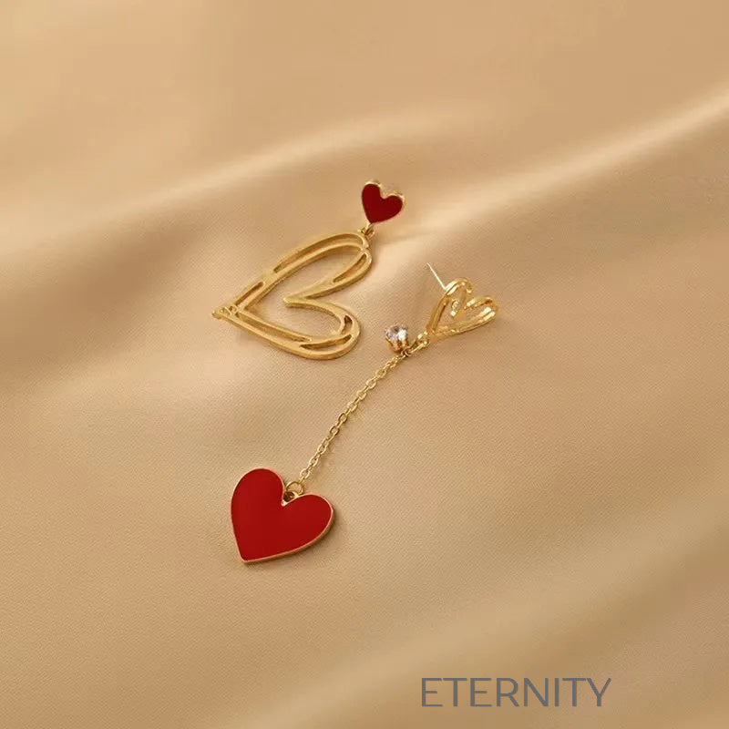 Zarcillos Asimétricos de Corazón en Oro y Esmalte Rojo  Zarcillos Dorado Unica Acero Inoxidable  ETERNITY