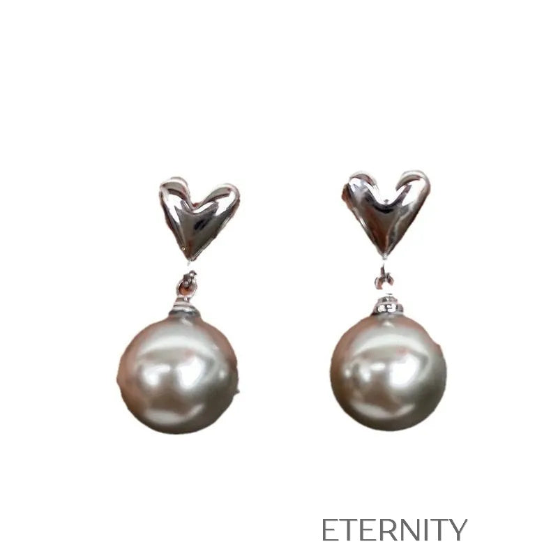 Aretes forma corazón creativa Zarcillos Dorado Unica Acero Inoxidable  ETERNITY