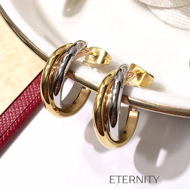 Zarcillos de Aro Trinity Fusion con Diseño de Bandas Entrelazadas Tricolor  Zarcillos Dorado Unica Acero Inoxidable  ETERNITY