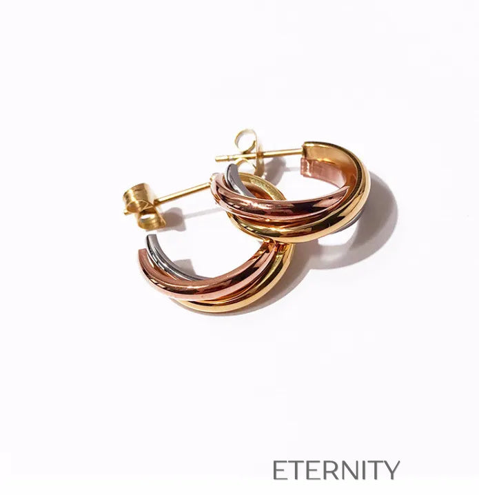 Zarcillos de Aro Trinity Fusion con Diseño de Bandas Entrelazadas Tricolor  Zarcillos Dorado Unica Acero Inoxidable  ETERNITY