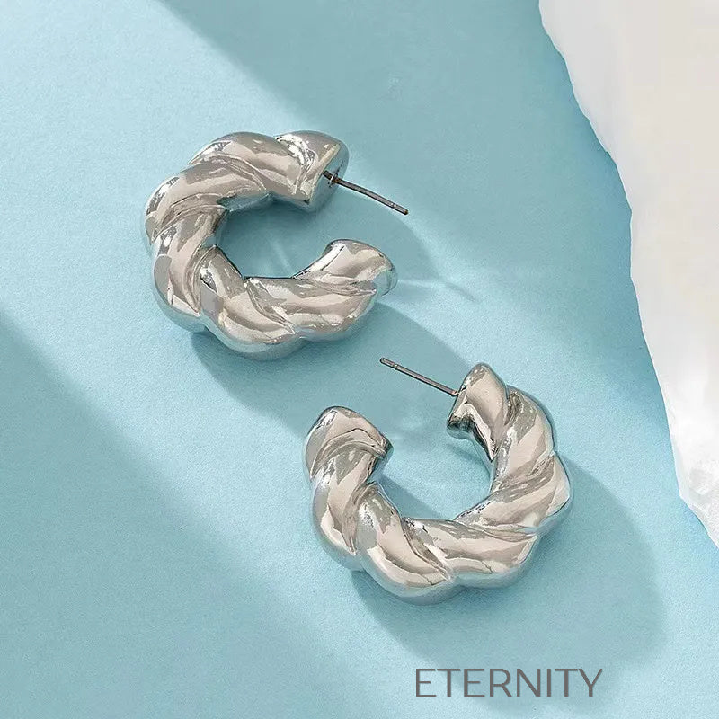 Zarcillos de Aro Twisted Infinity con Diseño Entrelazado en Oro y Plata  Zarcillos Dorado Unica Acero Inoxidable  ETERNITY