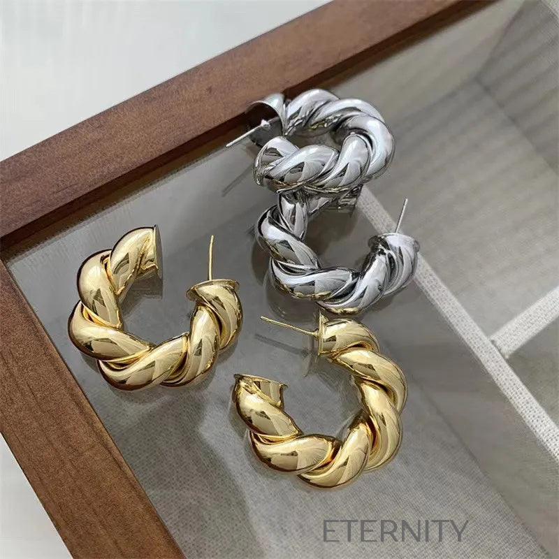 Zarcillos de Aro Twisted Infinity con Diseño Entrelazado en Oro y Plata  Zarcillos Dorado Unica Acero Inoxidable  ETERNITY