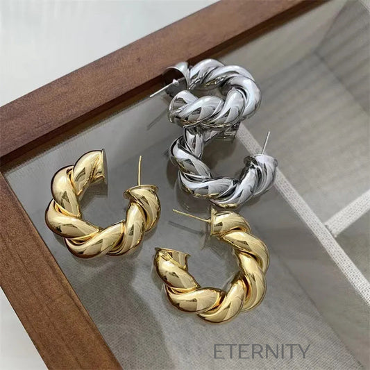 Zarcillos de Aro Twisted Infinity con Diseño Entrelazado en Oro y Plata  Zarcillos Dorado Unica Acero Inoxidable  ETERNITY