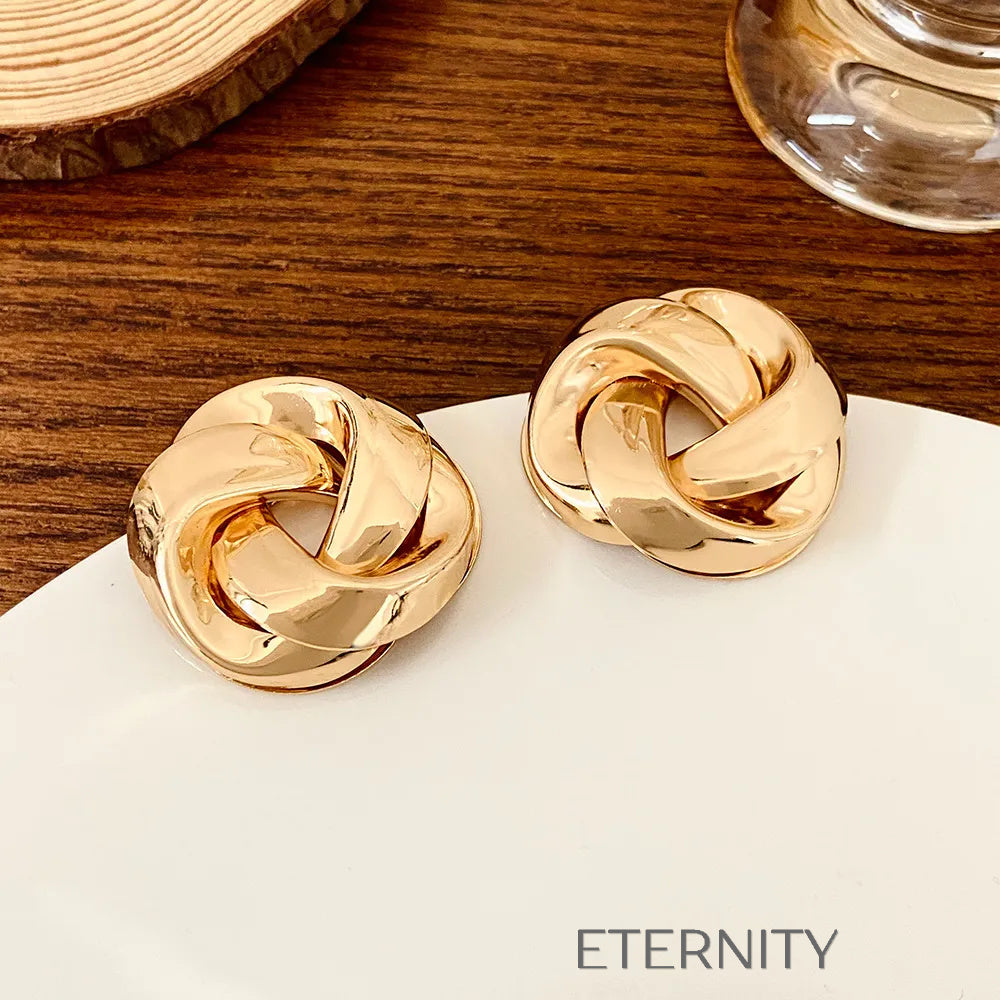 Zarcillos de Botón Eternal Knot con Diseño Entrelazado de Alto Pulido  Zarcillos Dorado Unica Acero Inoxidable  ETERNITY