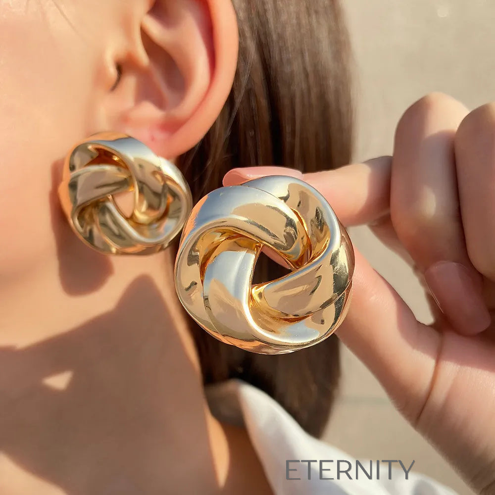 Zarcillos de Botón Eternal Knot con Diseño Entrelazado de Alto Pulido  Zarcillos Dorado Unica Acero Inoxidable  ETERNITY