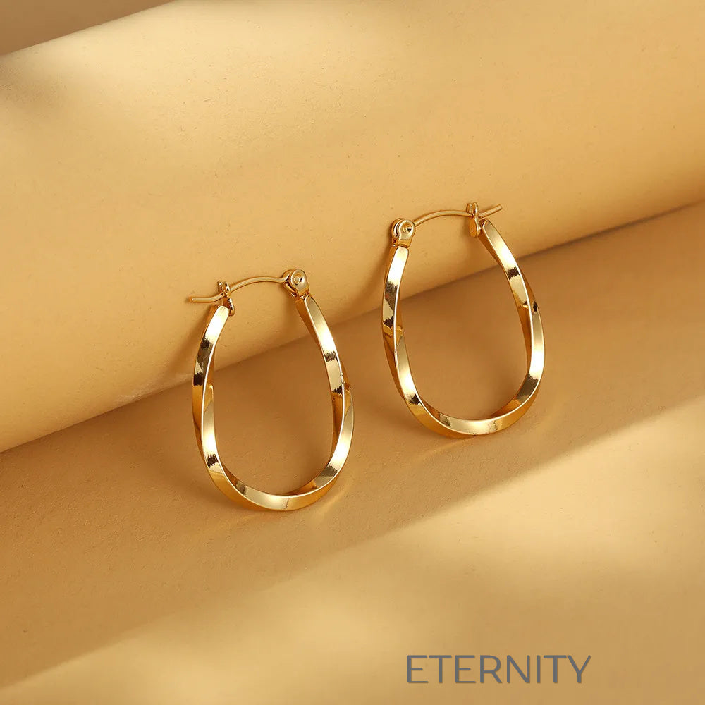 Aros Infinite Twist Ovalados  Zarcillos Dorado Unica Acero Inoxidable  ETERNITY