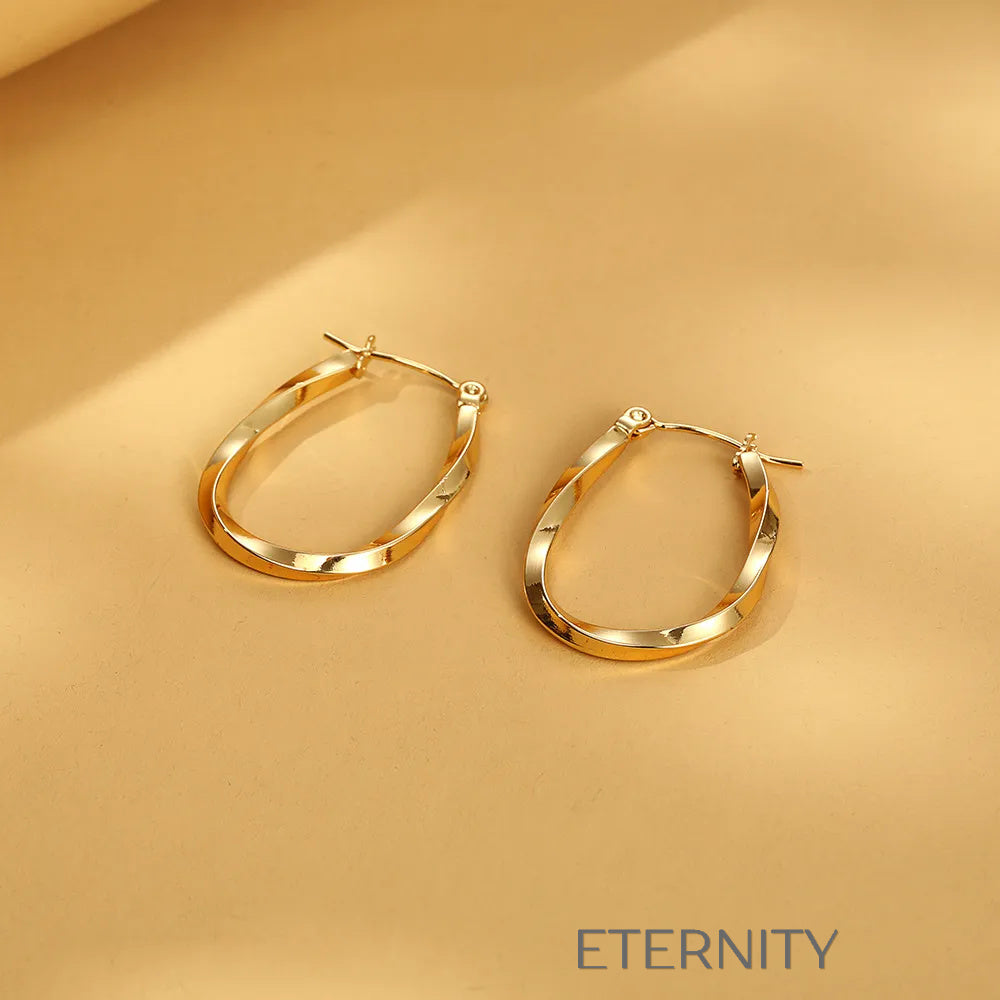 Aros Infinite Twist Ovalados  Zarcillos Dorado Unica Acero Inoxidable  ETERNITY