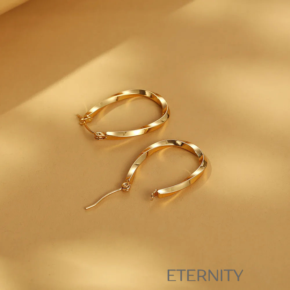 Aros Infinite Twist Ovalados  Zarcillos Dorado Unica Acero Inoxidable  ETERNITY