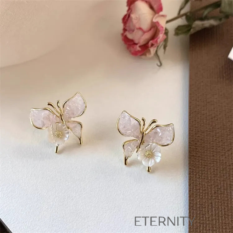 Zarcillos de Mariposa con Efecto Nácar y Flor Central  Zarcillos Azul Unica Acero Inoxidable  ETERNITY