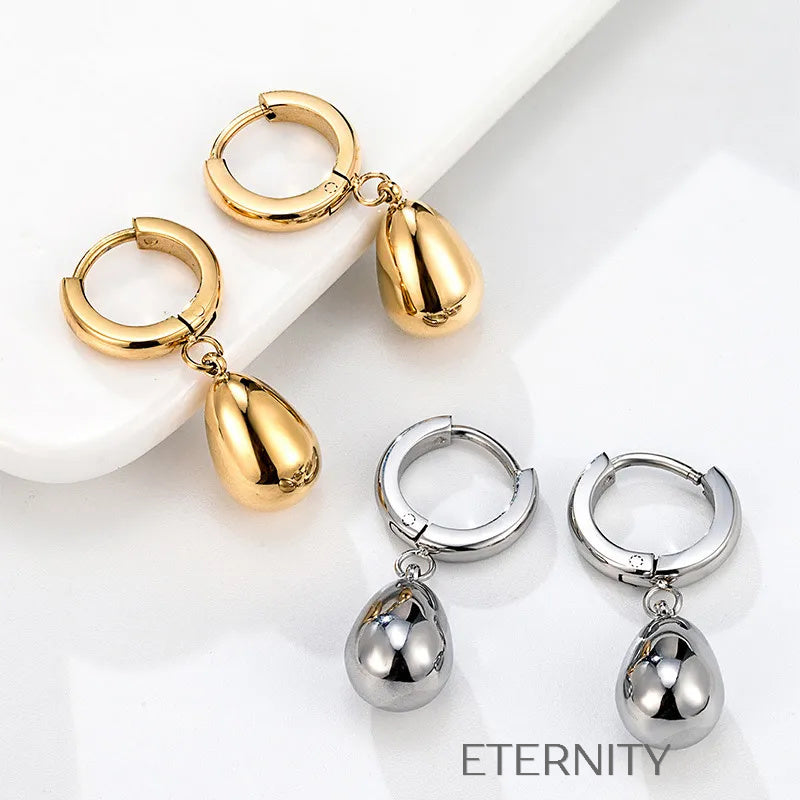 Mini Argollas Huggie con Dije de Gota en Oro y Plata  Zarcillos Dorado Unica Acero Inoxidable  ETERNITY