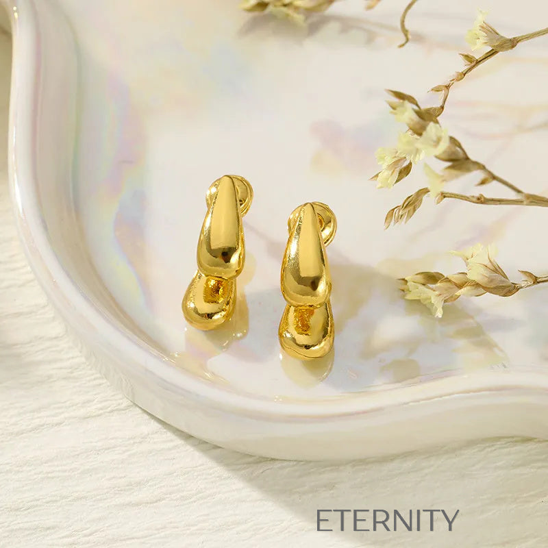Zarcillos Liquid Bicolor  Zarcillos Dorado Unica Acero Inoxidable  ETERNITY