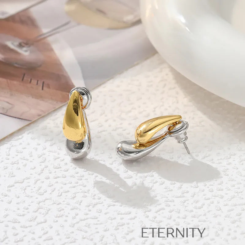 Zarcillos Liquid Bicolor  Zarcillos Dorado Unica Acero Inoxidable  ETERNITY