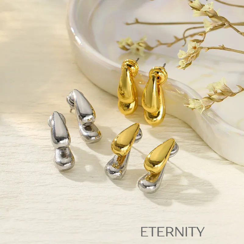 Zarcillos Liquid Bicolor  Zarcillos Dorado Unica Acero Inoxidable  ETERNITY