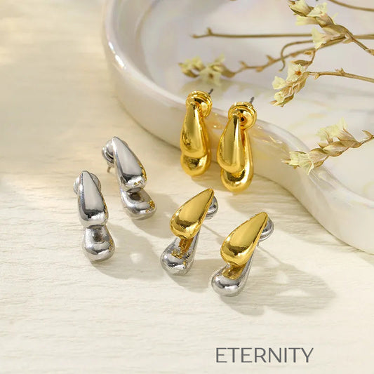 Zarcillos Liquid Bicolor  Zarcillos Dorado Unica Acero Inoxidable  ETERNITY