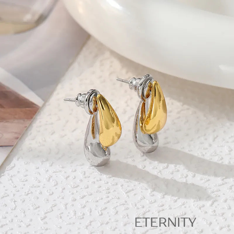 Zarcillos Liquid Bicolor  Zarcillos Dorado Unica Acero Inoxidable  ETERNITY