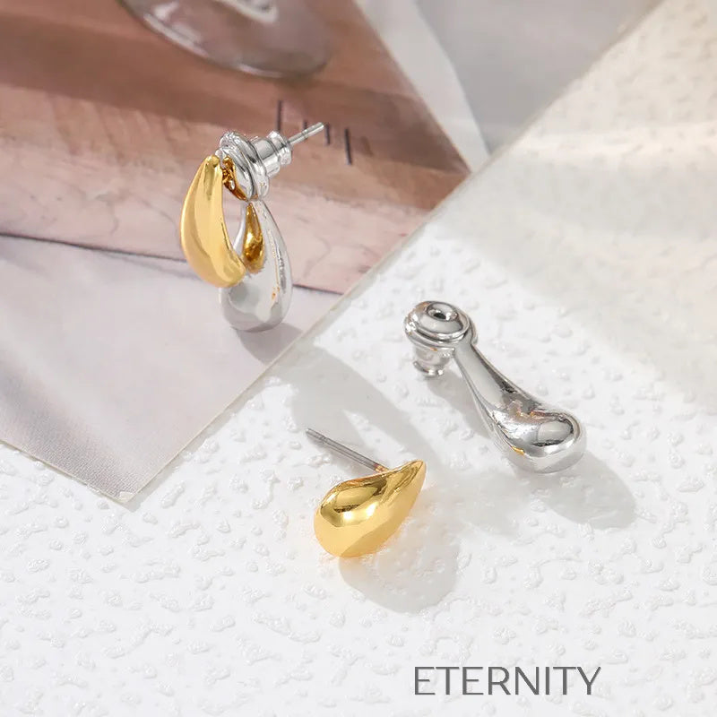 Zarcillos Liquid Bicolor  Zarcillos Dorado Unica Acero Inoxidable  ETERNITY