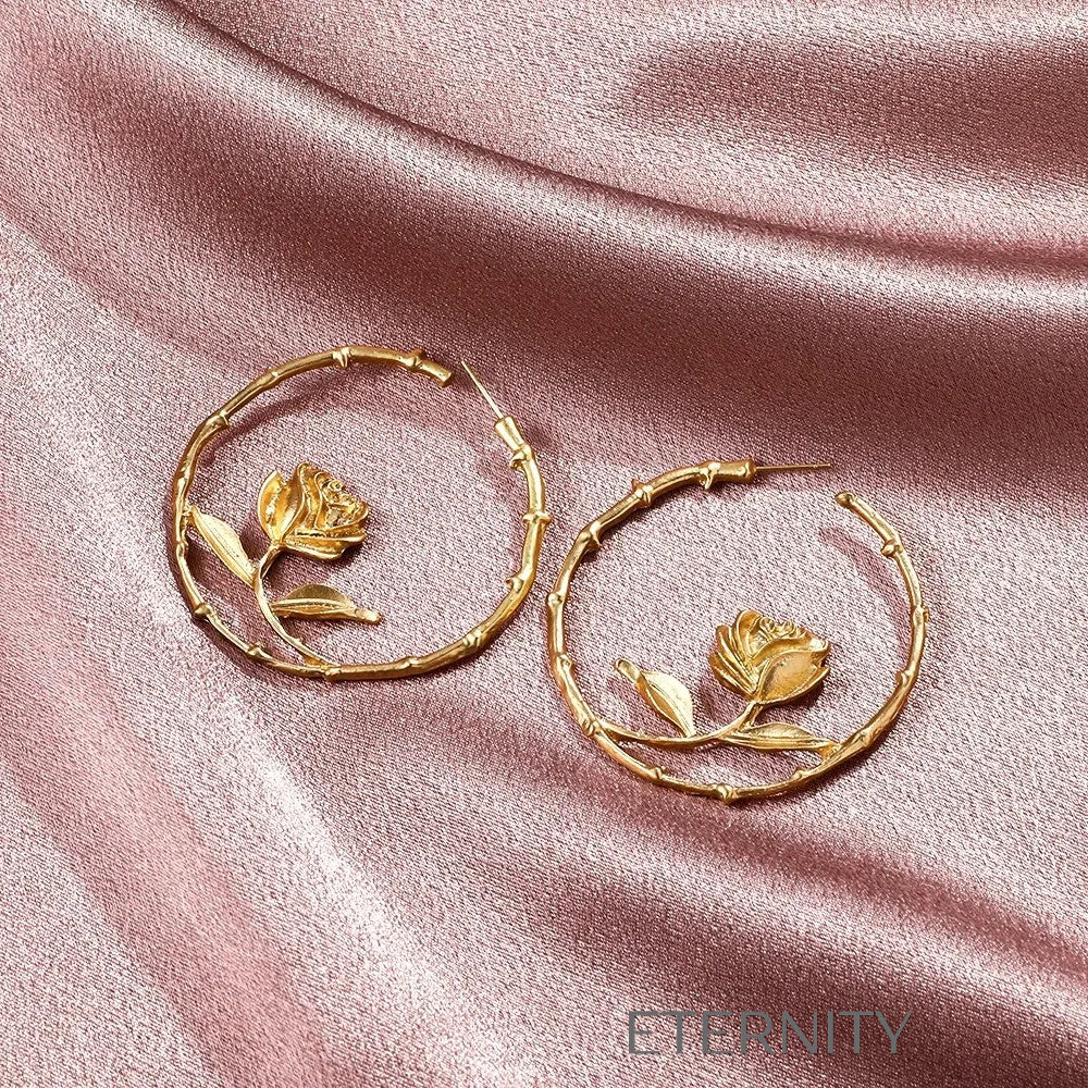 Zarcillos de Aro Ethereal Rose con Diseño Botánico y Silueta de Rosa  Zarcillos Dorado Unica Acero Inoxidable  ETERNITY