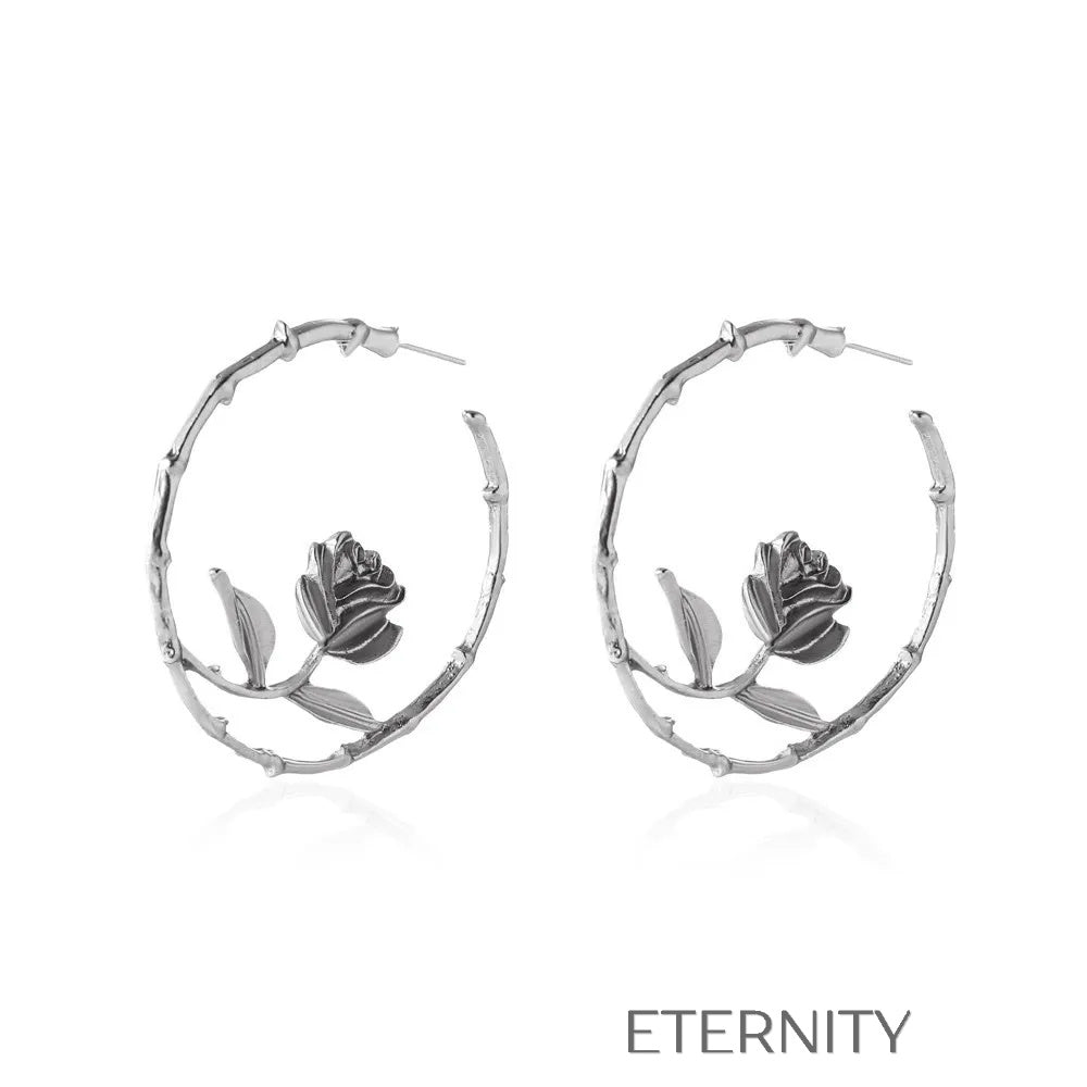 Zarcillos de Aro Ethereal Rose con Diseño Botánico y Silueta de Rosa  Zarcillos Dorado Unica Acero Inoxidable  ETERNITY