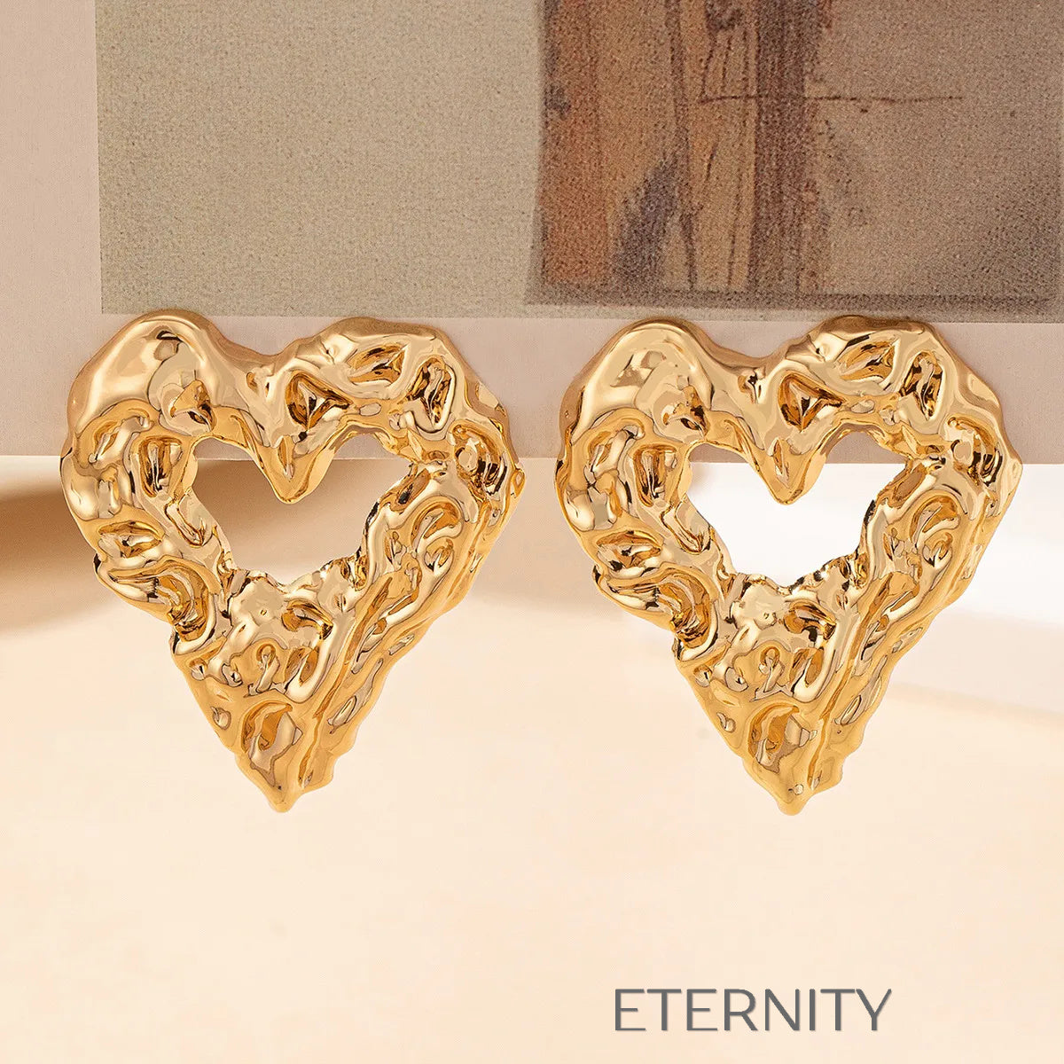Zarcillos de Corazón Liquid Gold con Textura Rugosa y Diseño de Autor  Zarcillos Dorado Unica Acero Inoxidable  ETERNITY