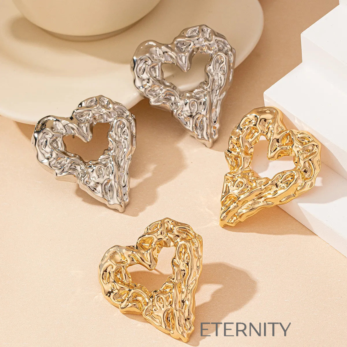 Zarcillos de Corazón Liquid Gold con Textura Rugosa y Diseño de Autor  Zarcillos Dorado Unica Acero Inoxidable  ETERNITY