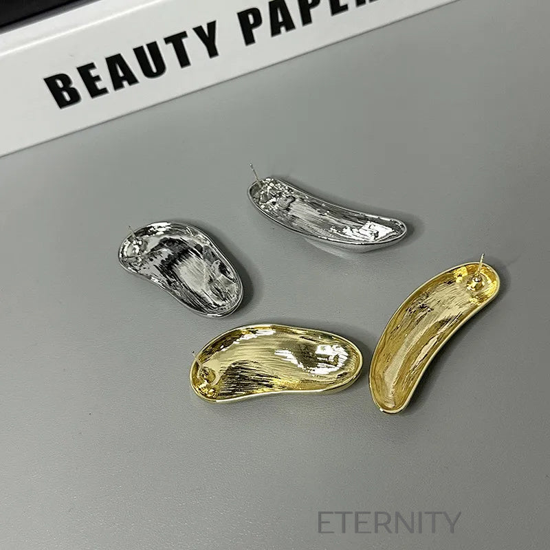 Zarcillos Liquid Gold Orgánicos  Zarcillos Dorado Unica Acero Inoxidable  ETERNITY