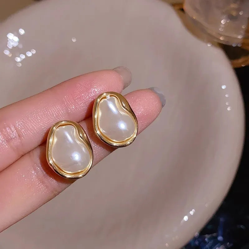 Argollas "Graceful Pearl" ETERNITY - Baño de Oro y Perla Pendiente