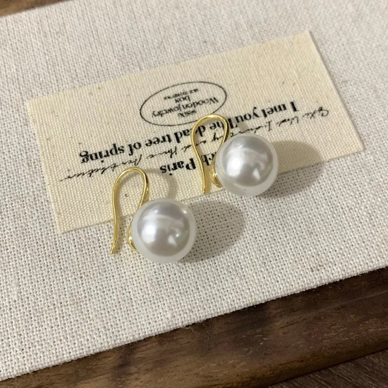 Argollas "Graceful Pearl" ETERNITY - Baño de Oro y Perla Pendiente