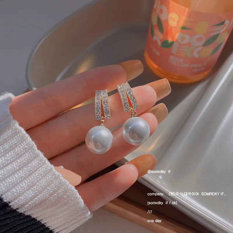 Argollas "Graceful Pearl" ETERNITY - Baño de Oro y Perla Pendiente