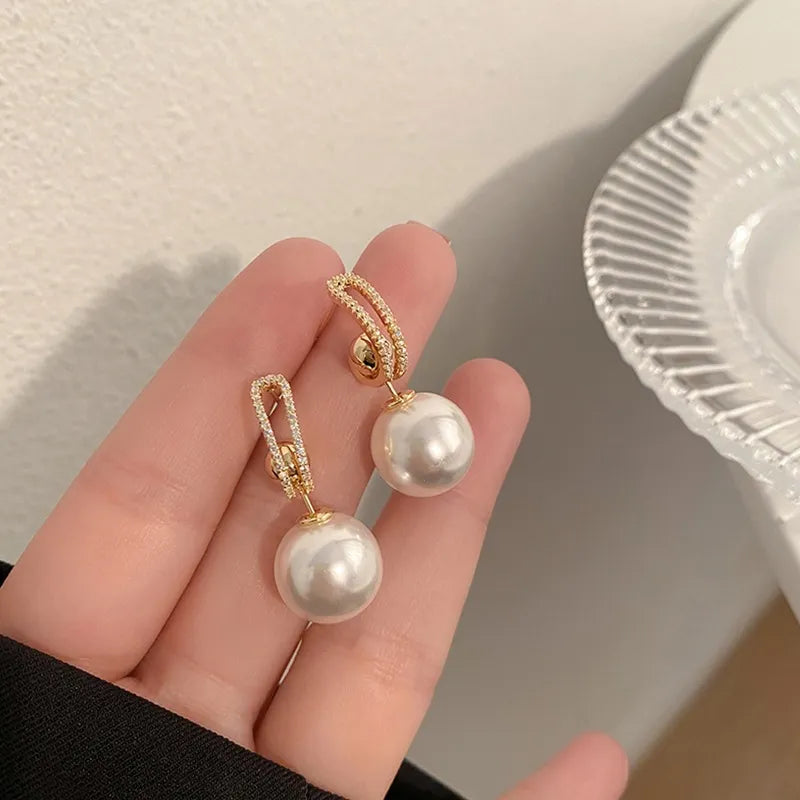 Argollas "Graceful Pearl" ETERNITY - Baño de Oro y Perla Pendiente