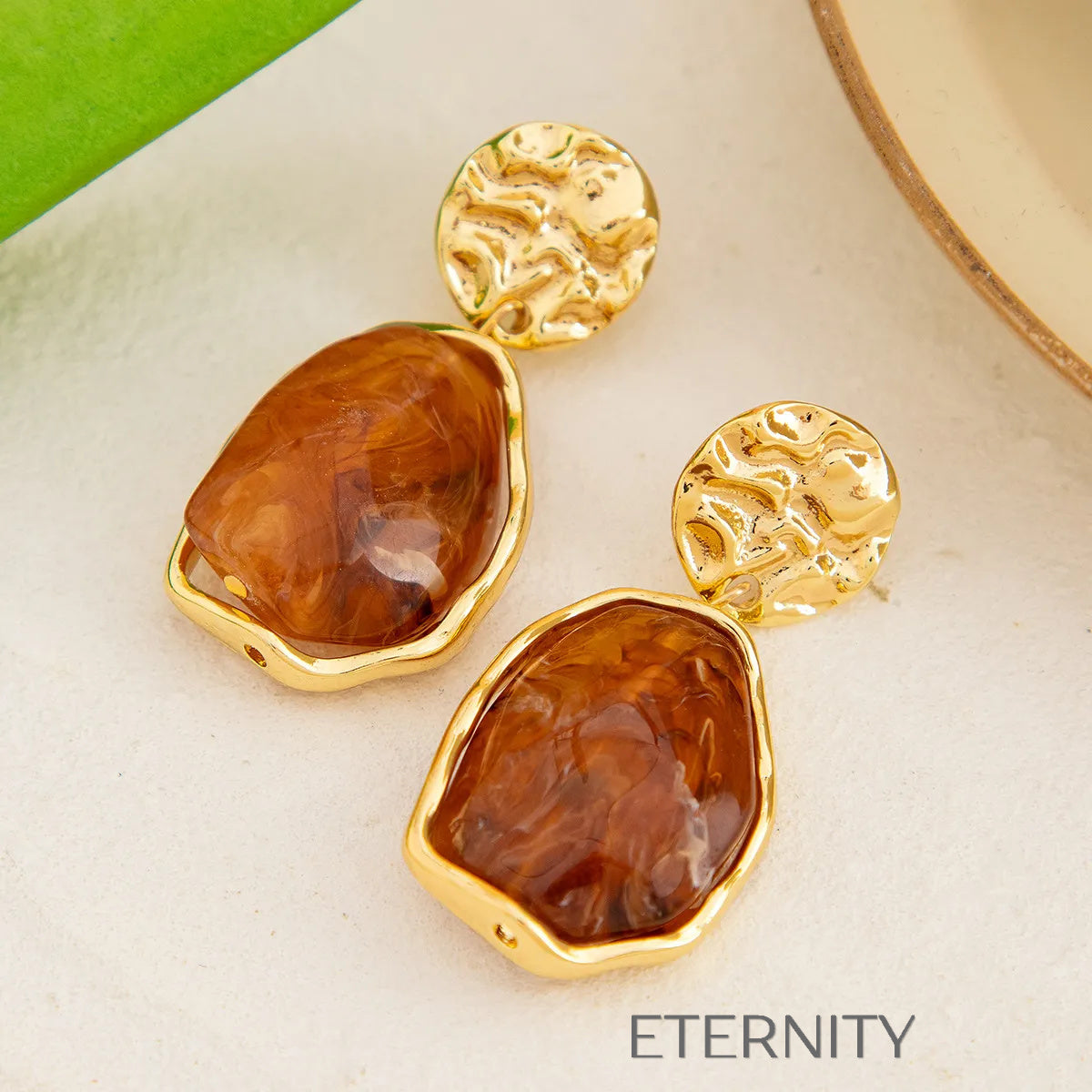 Zarcillos Colgantes de Oro con Piedra Ámbar Café y Blanco  Zarcillos 
Cafe Unica Acero Inoxidable  ETERNITY