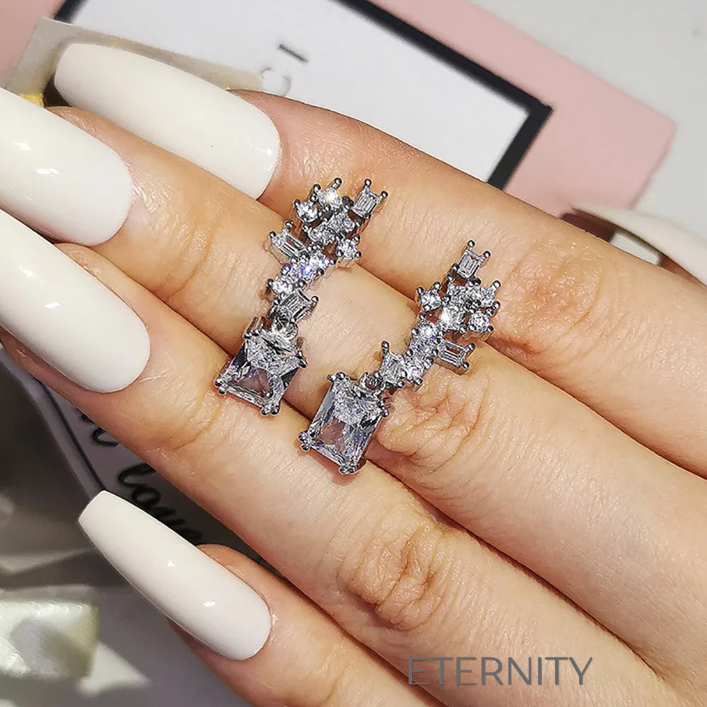Zarcillos Radiant Droplets con Cristales Baguette  Zarcillos Diamante Unica Acero Inoxidable  ETERNITY