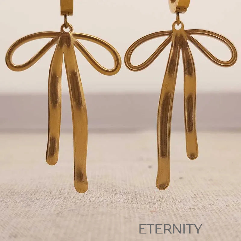 Zarcillos Textured Bow Hoops con Dije de Lazo Orgánico en Oro y Plata  Zarcillos Dorado Unica Acero Inoxidable  ETERNITY