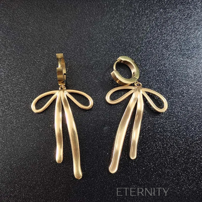 Zarcillos Textured Bow Hoops con Dije de Lazo Orgánico en Oro y Plata  Zarcillos Dorado Unica Acero Inoxidable  ETERNITY